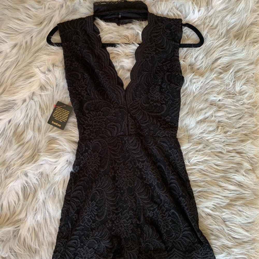 SOLD ON MERC Bebe black lace romper